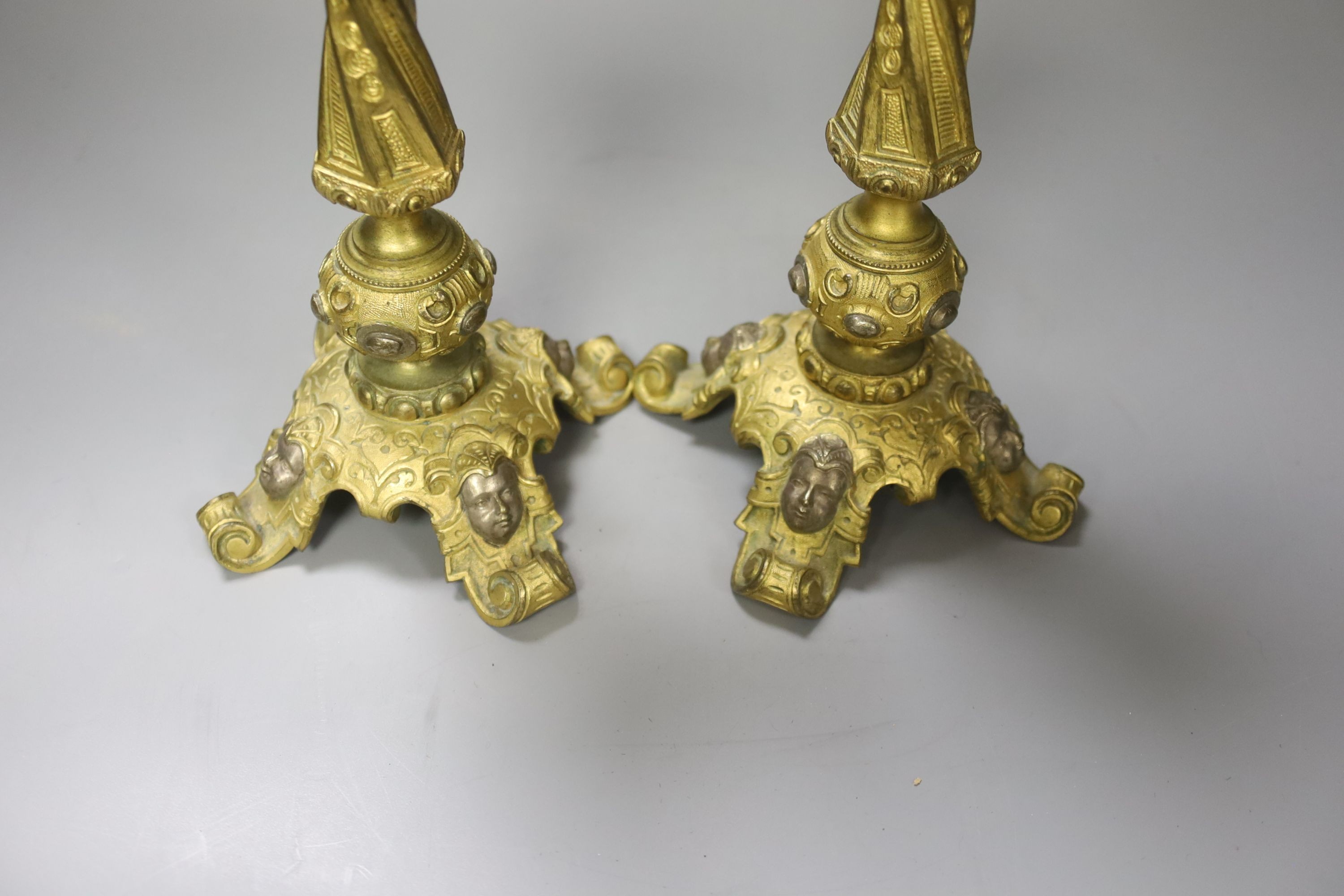 A pair of 19th century French ormolu candlesticks, 21cm